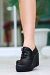 Dolgu Topuk Fermuarlı Siyah Cilt Kadın Ayakkabı